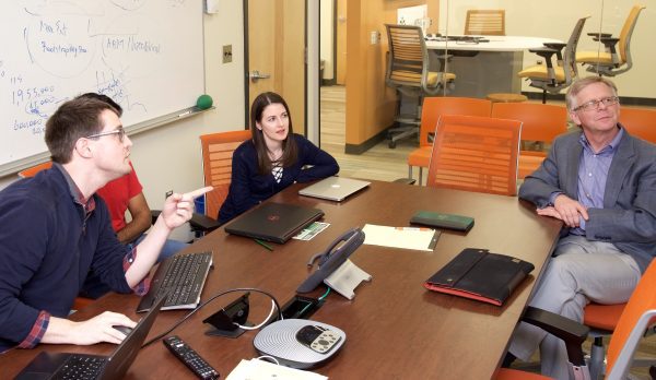 data science researchers in a room discussing