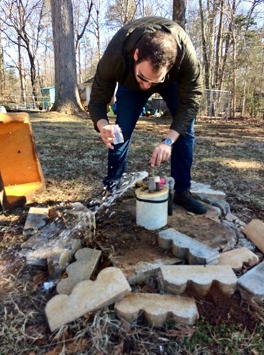 man testing a well