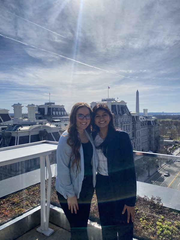 Grace Cooper and Sonia Birla on a rooftop in Washington DC.