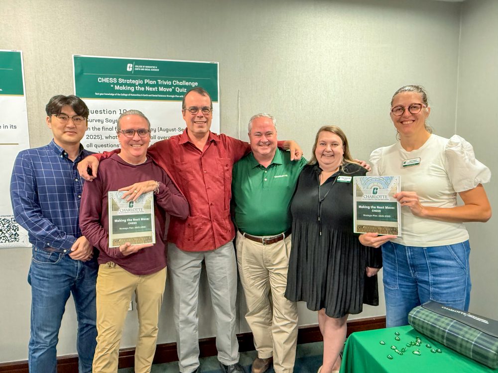 The six member strategic planning holds copies of the plan.