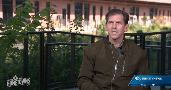 Mark Wilson with Camp North End brick buildings in the background