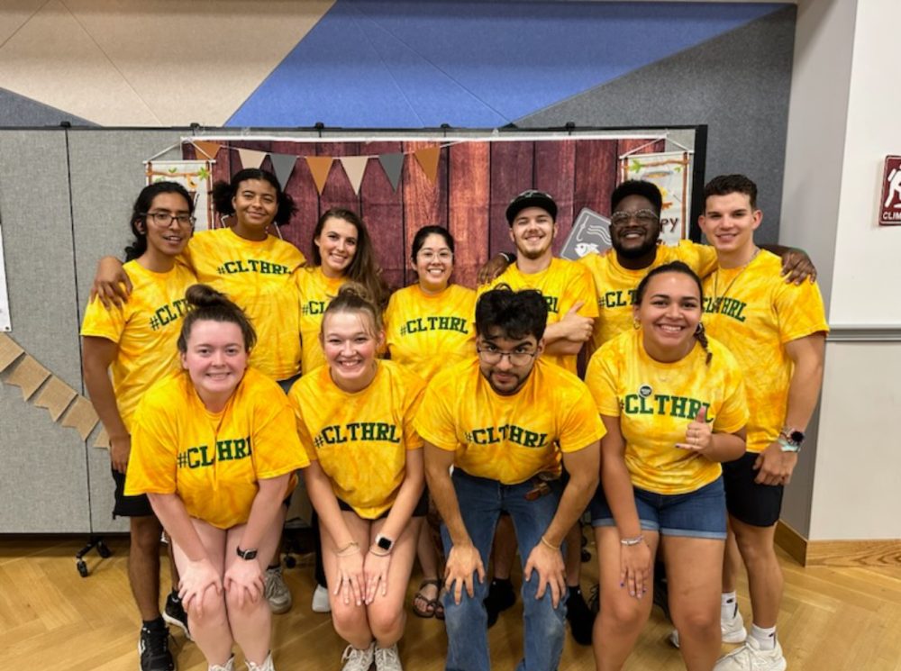 Scott Hall staff wear matching branded shirts for UNC Charlotte Housing and Residence Life.