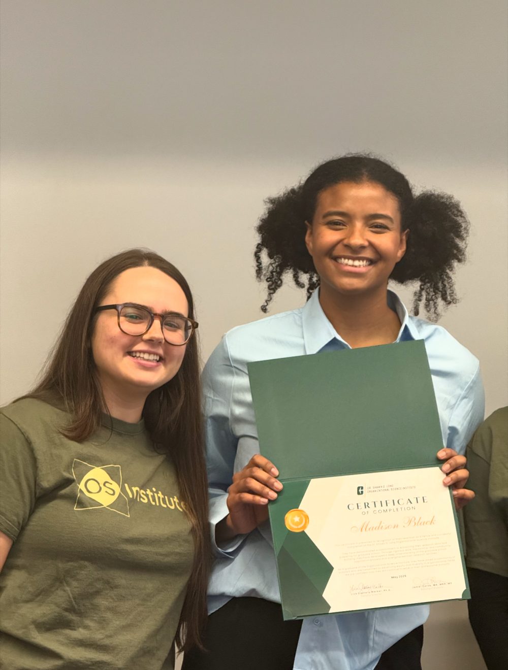 Madison Black poses with her mentor and the certificate from the Shawn Long Institute.