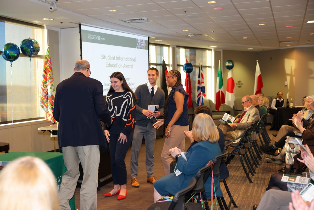 Hill being presented with her award.