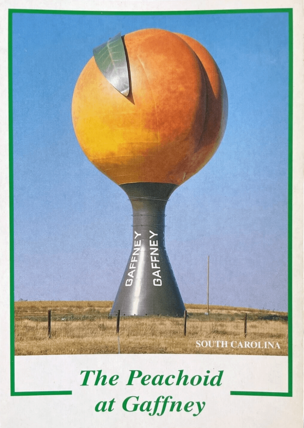Vintage postcard of the Gaffney peach that says "The Peachoid at Gaffney"