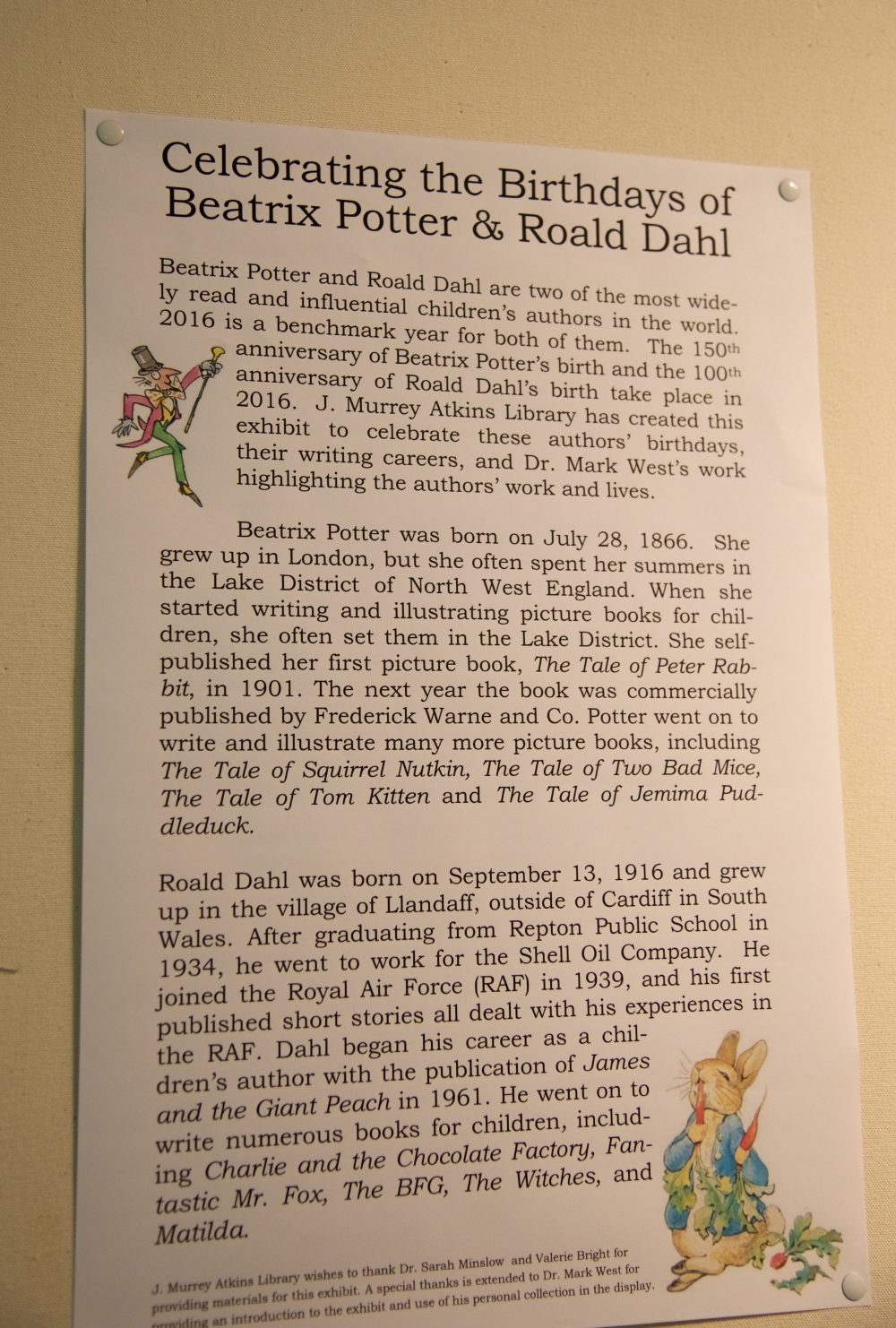 Sign describing a 2016 book display celebrating the birthdays of Beatrix Potter and Roald Dahl.