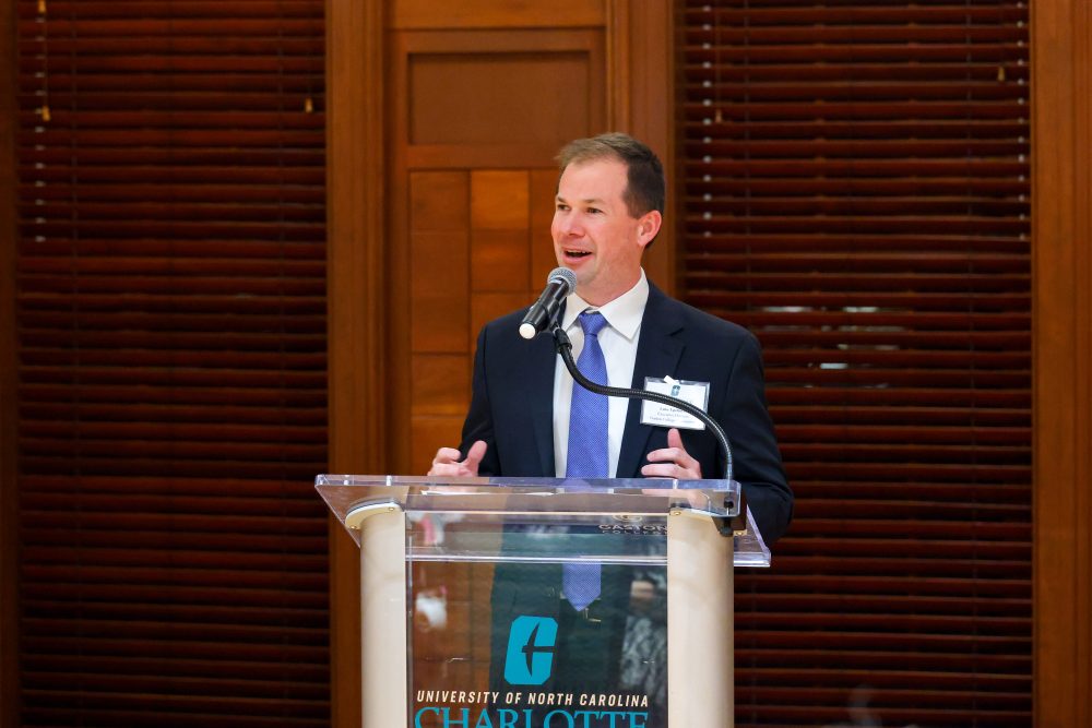 Luke Upchurch, executive director of the Gaston College Foundation, speaks from the podium.