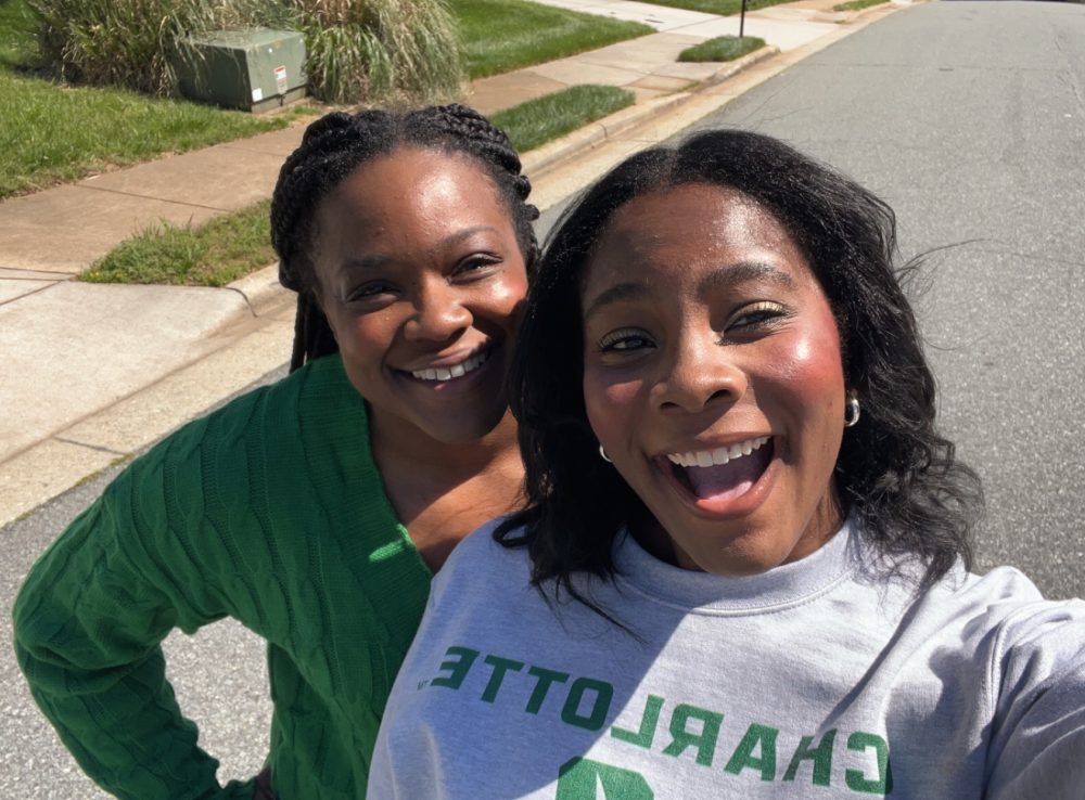 Frink takes a selfie with her mother outside.