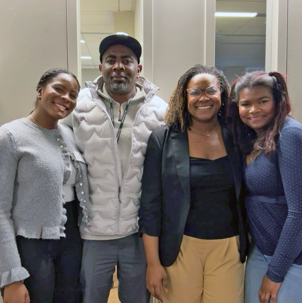 Frink smiles alongside her father, mother and sister.