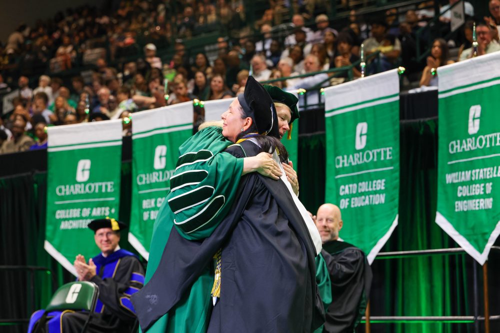 UNC Charlotte Chancellor Sharon L. Gaber hugs Susana Cisneros