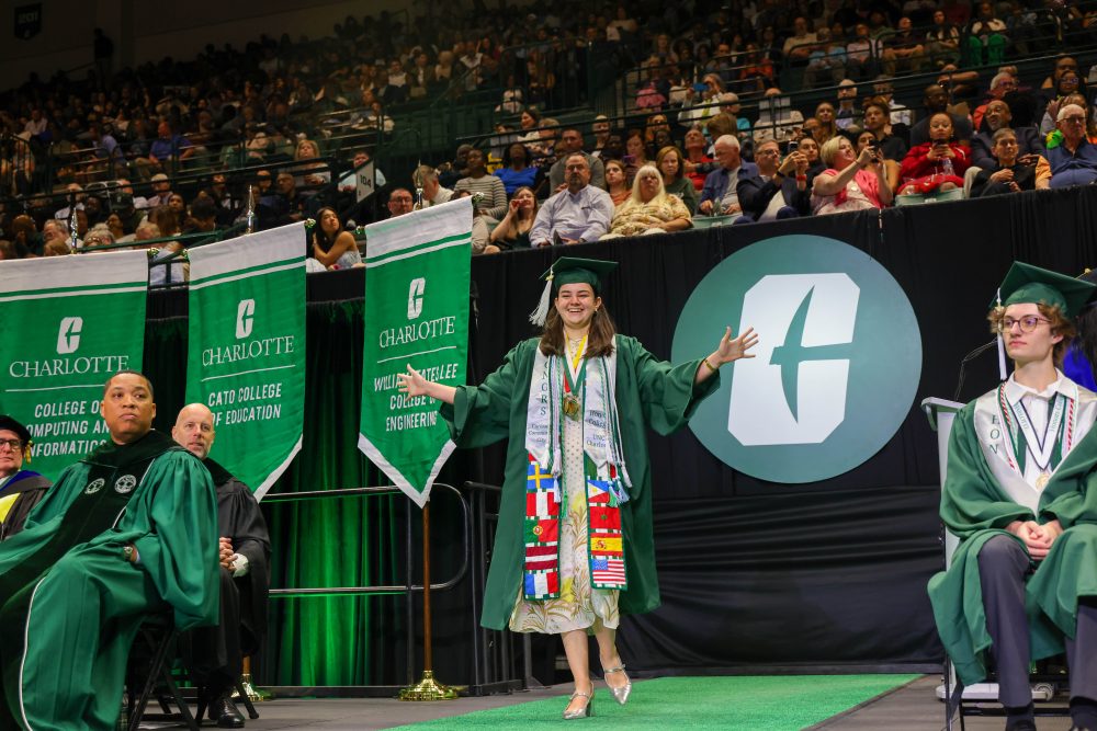 UNC Charlotte graduate Annabelle Hill crosses the stage.