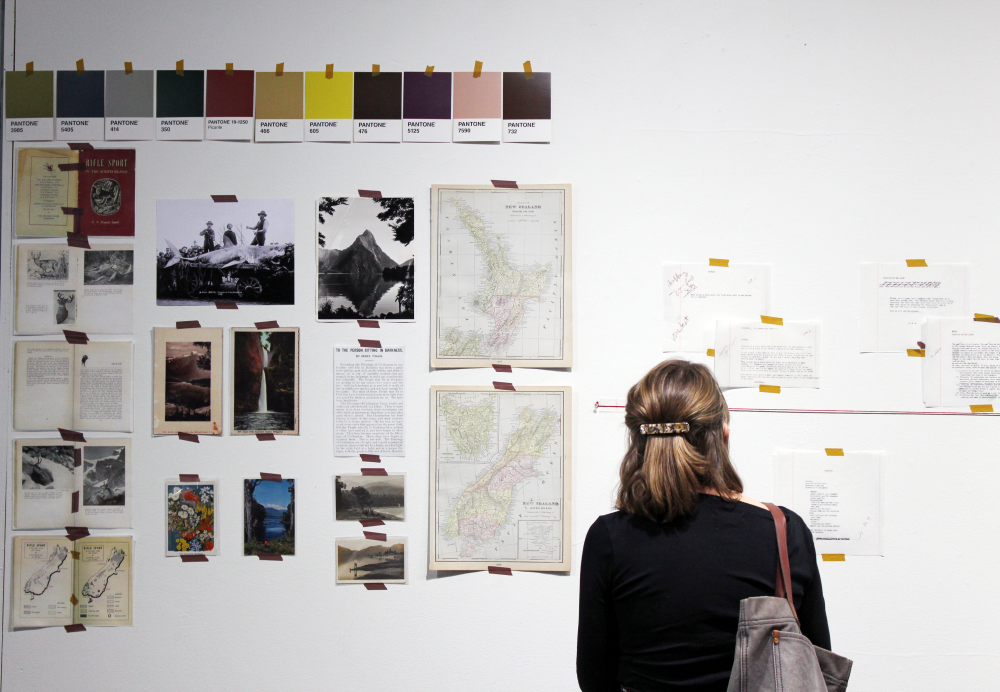 Hutchcraft reads the text on the gallery wall.