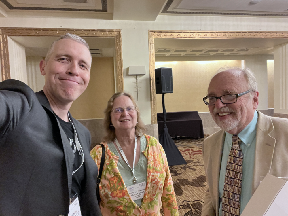 West poses for a selfie with friends and colleagues Carl Miller and Katharine Kittredge.