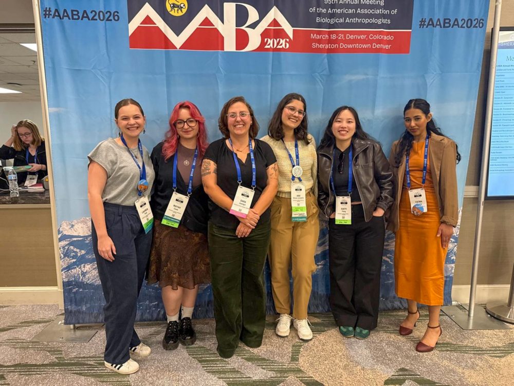 Mayah Clark, UNC Charlotte anthropology student in the College of Humanities & Earth and Social Sciences who conducted undergraduate and honors research, with Sara Juengst, Ph.D. and four other attendees from UNC Charlotte to the 2026 annual meeting of the American Association of Biological Anthropologists.